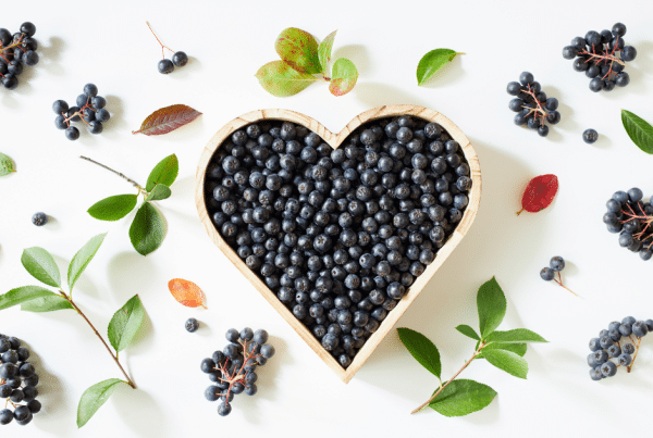 Aronia Berries in a heart shaped bowl.